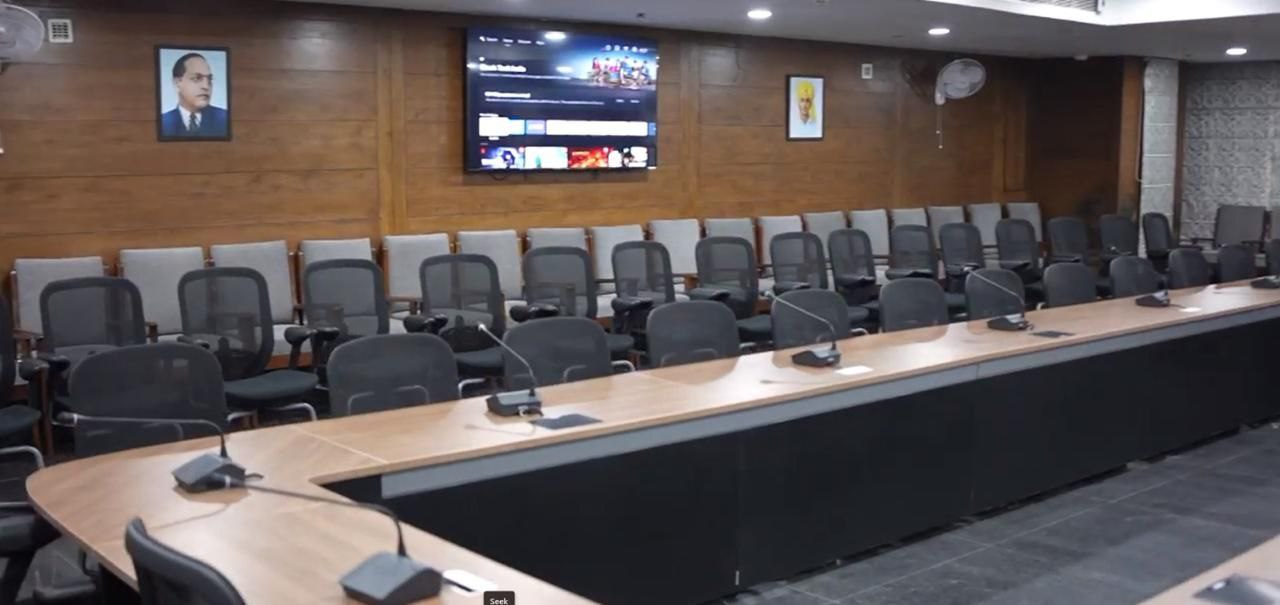 Conference room with presentation setup at Kisan Bhawan